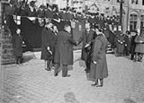 The Mayor of Mons, left, meets the Deputy Mayors of Valenciennes, right Nov. 1918