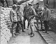 (British) Two men of an Imperial Battalion captured by the Germans after their escape to our lines, being interrogated by Canadian Corps Intelligence Officers, Neuville, Vitasse. Sept. 1918 September 1918.