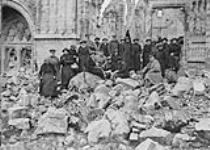 Canadian Sisters among the ruins of shell-torn Ypres. January, 1919 1914-1919