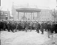 Corps Commander explains demobilization to Canadian Troops in the square at Andenne, February 1919 Feb. 1919