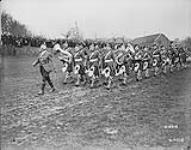 85th Inf. Bn Band march past at Chanbrire.- 'Inspection of 4th Cdn Div. by King Albert of Belgium.' March 1919 Mar. 1919