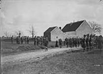 72nd Inf. Bn marching past Gen Currie Ohain Belgium. April 1919 Apr. 1919