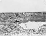 The Ducks Bill Crater looking towards La Bassée. The scene of the attack by the 1st Cdn Inf. Bn June 1915, Apr. 1919