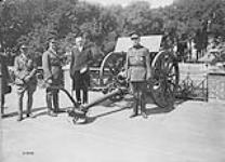 (Presentation of Cdn. Guns to City of Mons.) Lt-Col. W. Bovey, Burgomaster Lescarts and Lt-Gen. Clooten. April & May 1919 May, 1919.