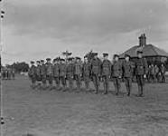 H.R.H. The Duke of Connaught inspecting Canadians and awarding decorations. Seaford [between 1914-1919].