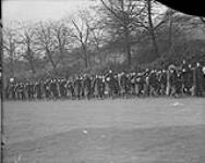 Canadians marching to station to proceed to Canada for discharge, Buxton, C.D.D. [Canadian Discharge Depot] 1914-1919
