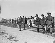 Sir R.L. Borden and Lieut-Gen Sir R.E.W. Turner inspecting Canadian troops at Seaford, August 11th 1918 August 11, 1918.