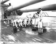 Jack's early morning job. Washing down decks Feb., 1917.