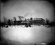 Government House at Rideau Hall - front building seen from side in winter [before 1882].