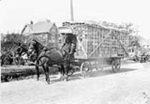 Load of Baskets going to Orchards June, 1910.