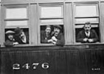 Scottish immigrants on train heading for the West [ca. 1911].