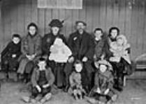 Mr. J. Gaston with a group of English immigrants [ca. 1911].