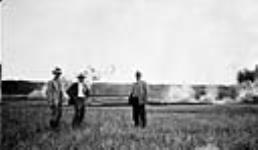 Burnign waste gas from Royalite wells, Turner Valley, Alta Aug. 1927