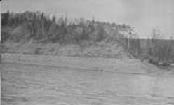 Exposure of bit. sand on Athabasca R. near mouth of Horse River, Alta June 1928