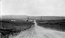 Turner Valley field (south part of) Mayland #2 (on right side); East Crest #1 (on left side) Sunlight #1 in distance, Alta July 1929