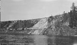 Typical outcrop of bit. sand, Firebag R., Alta. (5-98-7) 1931