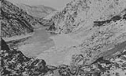 Grange Mine, B.C. Camp from West Bank of Fraser River. (Looking North) Kelly Creek. Fraser R Jan. 1936