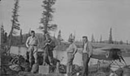 [Geologists with Fairchild 71 aircraft of the R.C.A.F., on the Sloan River near Great Bear Lake, N.W.T. Individuals include Joliffe, D.E. Kidd, R.C. McDonald, September 1931.]