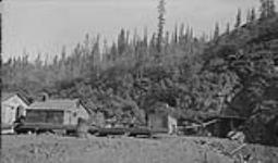 Cons. Mining & Smelting Co.'s workings entrance to lower adit, power house, etc., Cross Fault Lake, N.W.T Aug. 1937