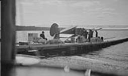 [Fairchild 71 aircraft of Canadian Airways Ltd. delivering cargo to Pickle Lake, Ont., August 1936.]