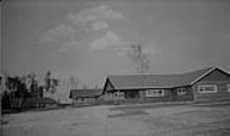 Little Long Lac [Longlac] Gold Mine - Guest lodge in foreground, Mgr's residence in background, Little Longlac, Ont Aug. 1, 1936