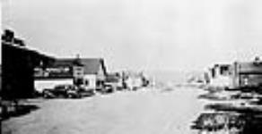 View of Franklin Ave., the business street, McMurray, Alta 1942