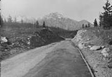 Paving operations, Jasper, Alta. (First commercial paving with Bit. sand in Alberta.) 1926