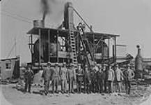 Trial run of new asphalt mixing machine, Mines Branch Experimental plant at Edmonton, Alta June 5, 1930