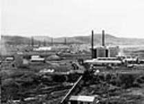 General view of Turner Valley showing Imperial Oil separator in foreground, Alta 1928