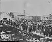 Wharf scene 5 July 1900