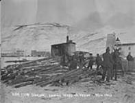 Sawing wood on Yukon Mar. 1903