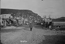 Street in South or upper-end Dawson along the Klondike river 1898-99