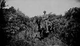 J. Hardoin on horse back 1920
