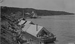 Waterfront at Fort Smith, N.W.T. [Norrish's scow in foreground.]