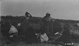 Native women of the Slavey nation pictured in a camp scene 1921
