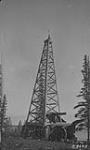 Oil derrick, 50 miles below Fort Norman, N.W.T 1921