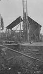 Oil well and derrick - Discovery well, Imperial Oil Co. [N.W.T.] 1921
