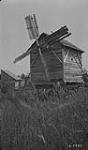 Homemade windmill, turned by hand to face wind, Vidir, Man., 1922 1922