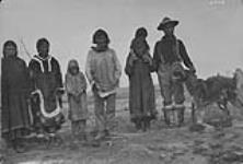 [Inuit at Fort McPherson, Northwest Territories] Original title: Eskimos at Fort McPherson, [N.W.T.] 1910