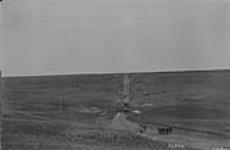 Grading a second class road, Sask. 4-12-2. [S.E. of Goodwater, Sask.] 1924
