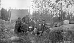 Pukatawagan Indian Reserve. Council meeting with Chief and Councillors and Father Desormeaux as interpreter. Man June 25, 1929