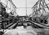 Construction of the Miramichi Bridges on the Intercolonial Railway. South West Branch. View showing progress of Pier F/Construction des ponts de Miramichi sur l'Intercolonial, pres de Newcastle. Embranchement sud-ouest. Vue montrant l'etat d'avancement 24 June 1873