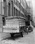 All boxes and shooks made by us were transported by our own fleet of automobiles. Henry Morgan & Co. Ltd. Montreal, P.Q 1918