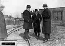 Sir Frank Baillie, K.C.B.E., Architect J.M. Lyle, Supt. J.B. Carswell - Probably visiting Canadian Aeroplanes Limited 1917