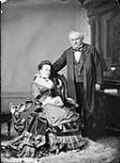 Hon. Marc Amable Girard and Wife(?) Mar. 1879