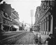 Decorations on Sparks Street for the welcoming home of the Ottawa volunteers to the Northwest Rebellions, of The Citizen July 25, 1885.