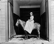 Lady Marjorie Gordon (daughter of Lord and Lady Aberdeen), on a pony at Rideau Hall Mar. 1894