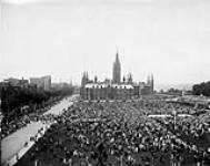 [A crowd during the Jubilee Celebrations] in front of the West Block July 1927