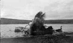 Herschel Island, Y.T., c. 1933. The demolition of the wreck of the "Cub" [ca. 1933]