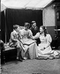 L. to R.: Archiei Gordon, Ebba Wetterman (the governess), Capt. John Sinclair (comptroller of Lord Aberdeen's household), and Marjorie Gordon May 1896